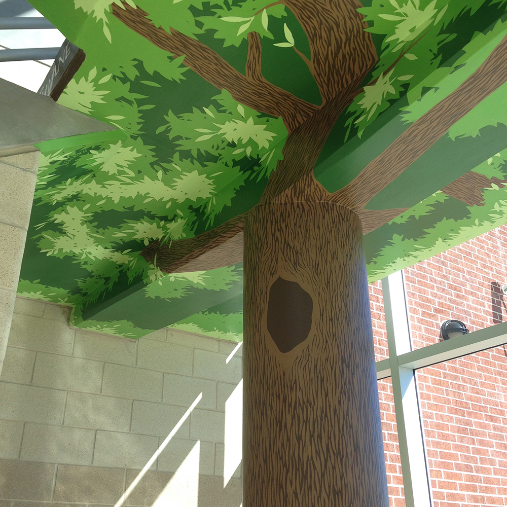 Detail of the painted tree trunk wrapping a column.